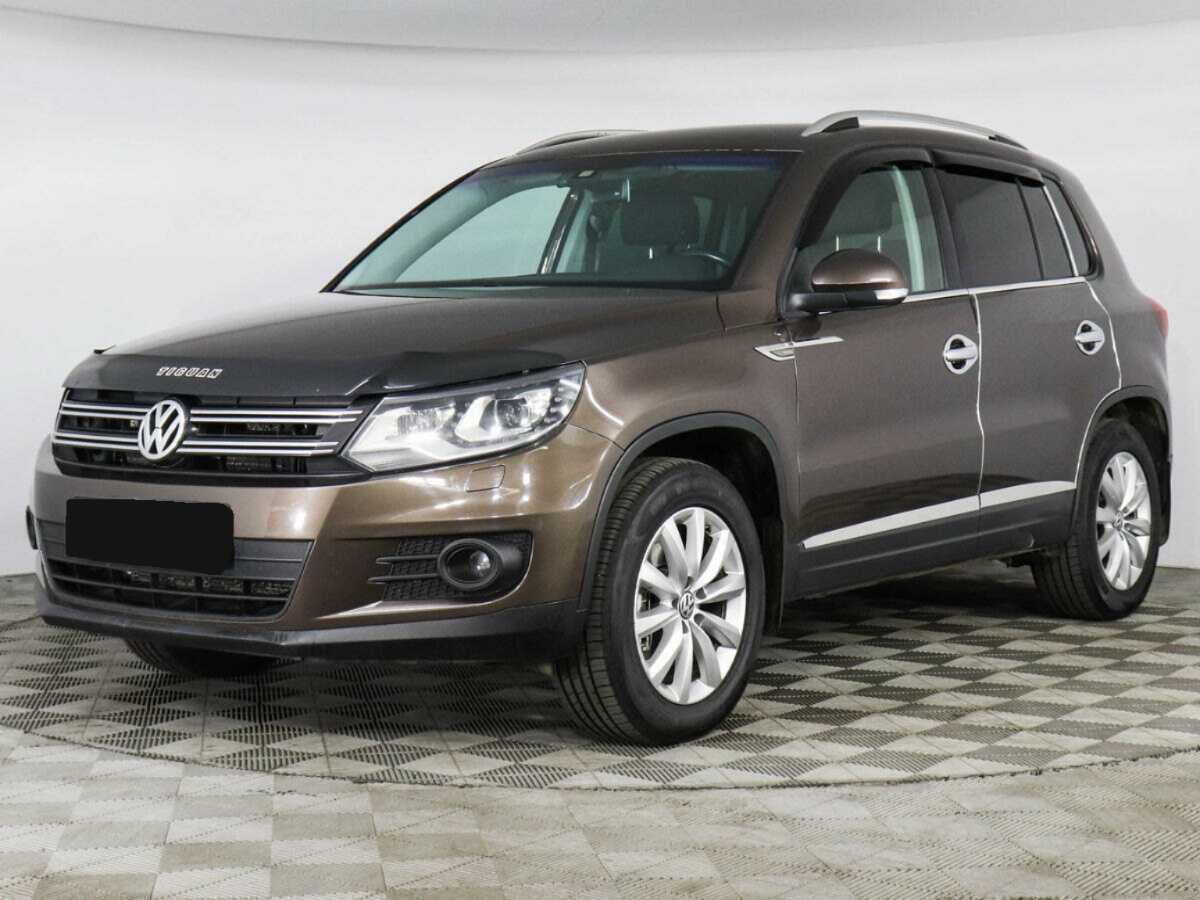 Купить Volkswagen Tiguan с пробегом. Посмотреть фото