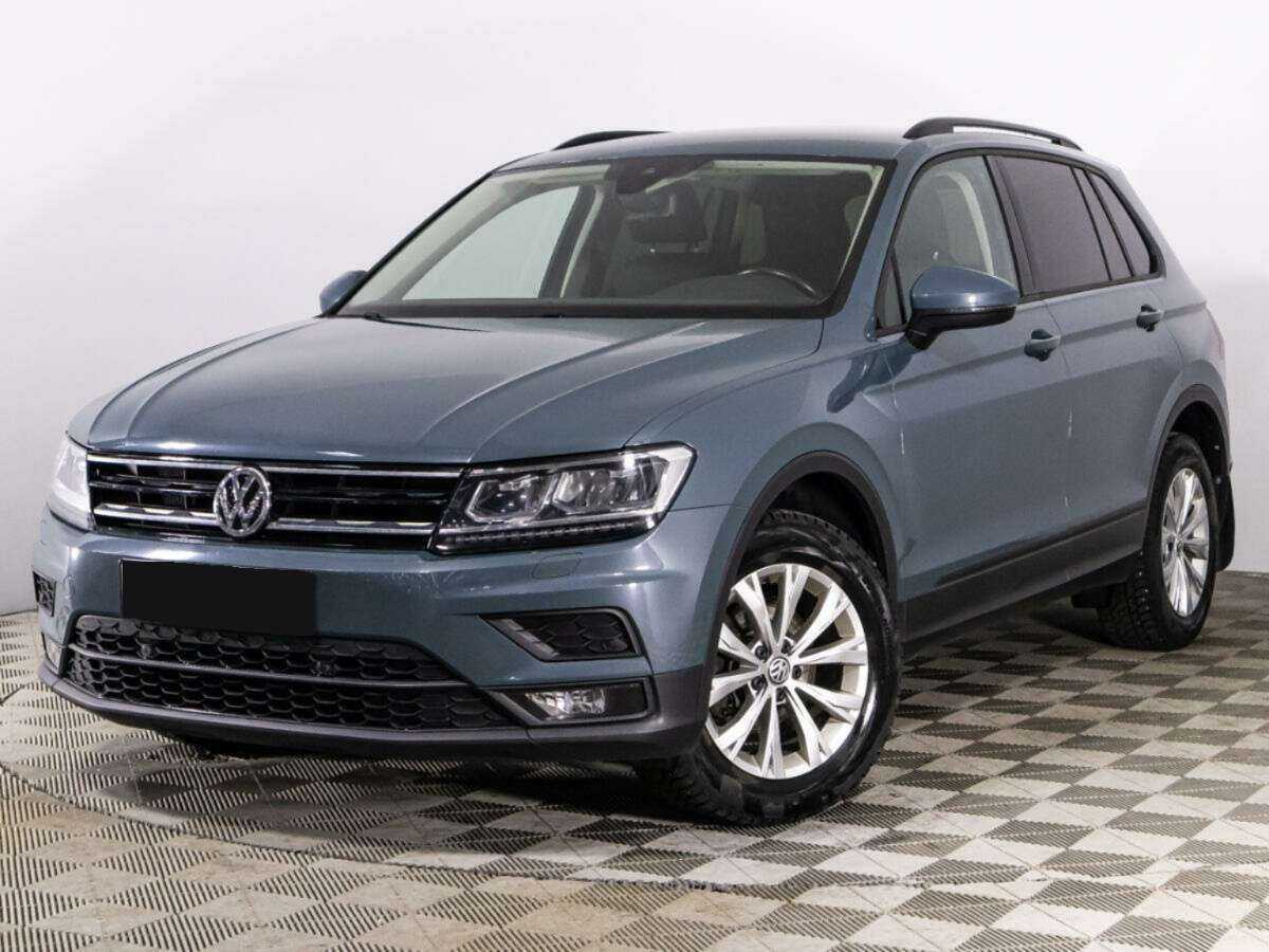 Купить Volkswagen Tiguan с пробегом. Посмотреть фото
