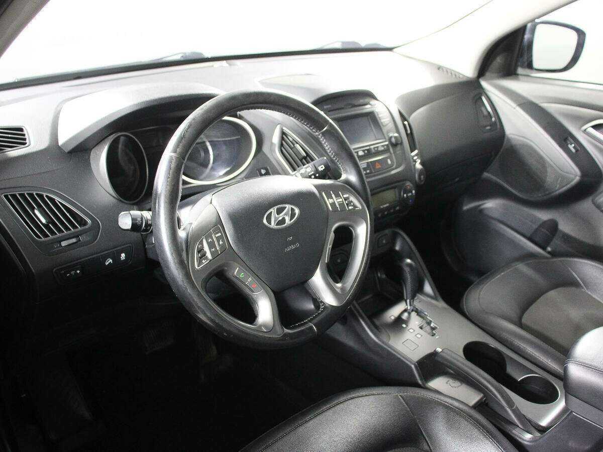Купить Hyundai ix35 с пробегом. Фото: #11