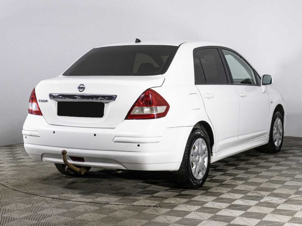 Купить Nissan Tiida с пробегом. Фото: #4