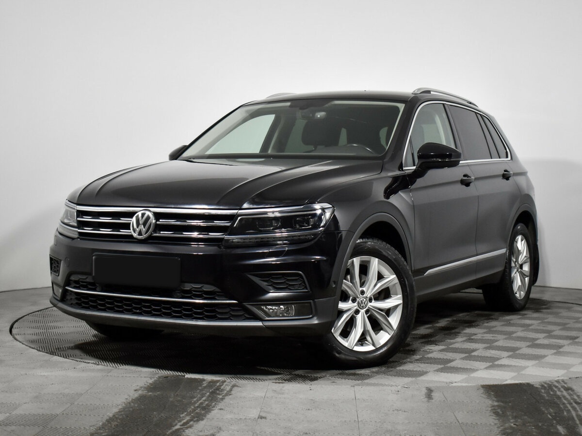 Купить Volkswagen Tiguan с пробегом. Посмотреть фото