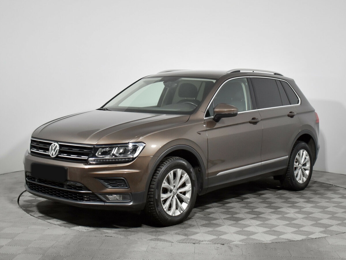 Купить Volkswagen Tiguan с пробегом. Посмотреть фото