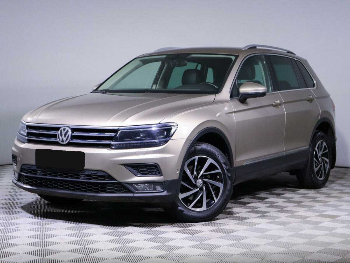 Купить Volkswagen Tiguan с пробегом. Посмотреть фото