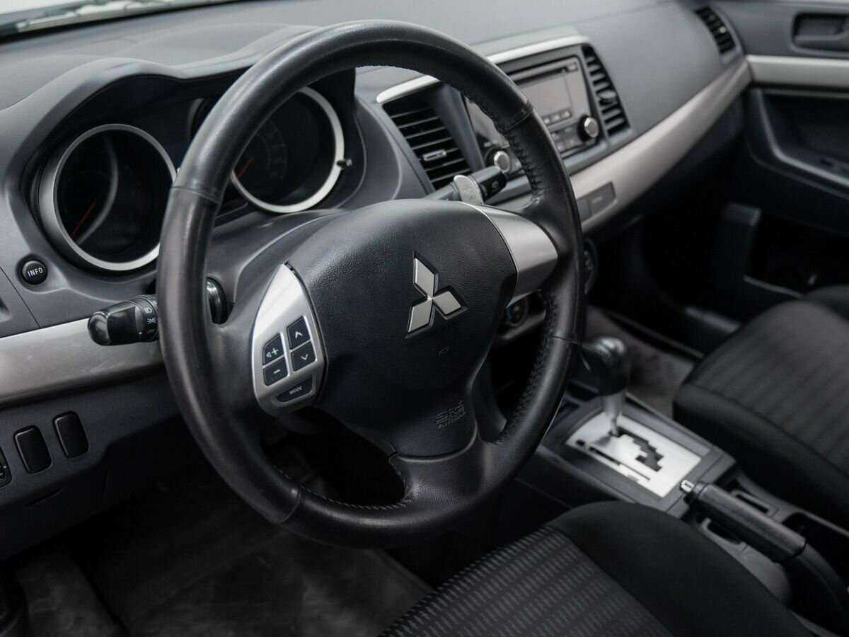 Купить Mitsubishi Lancer с пробегом. Фото: #11