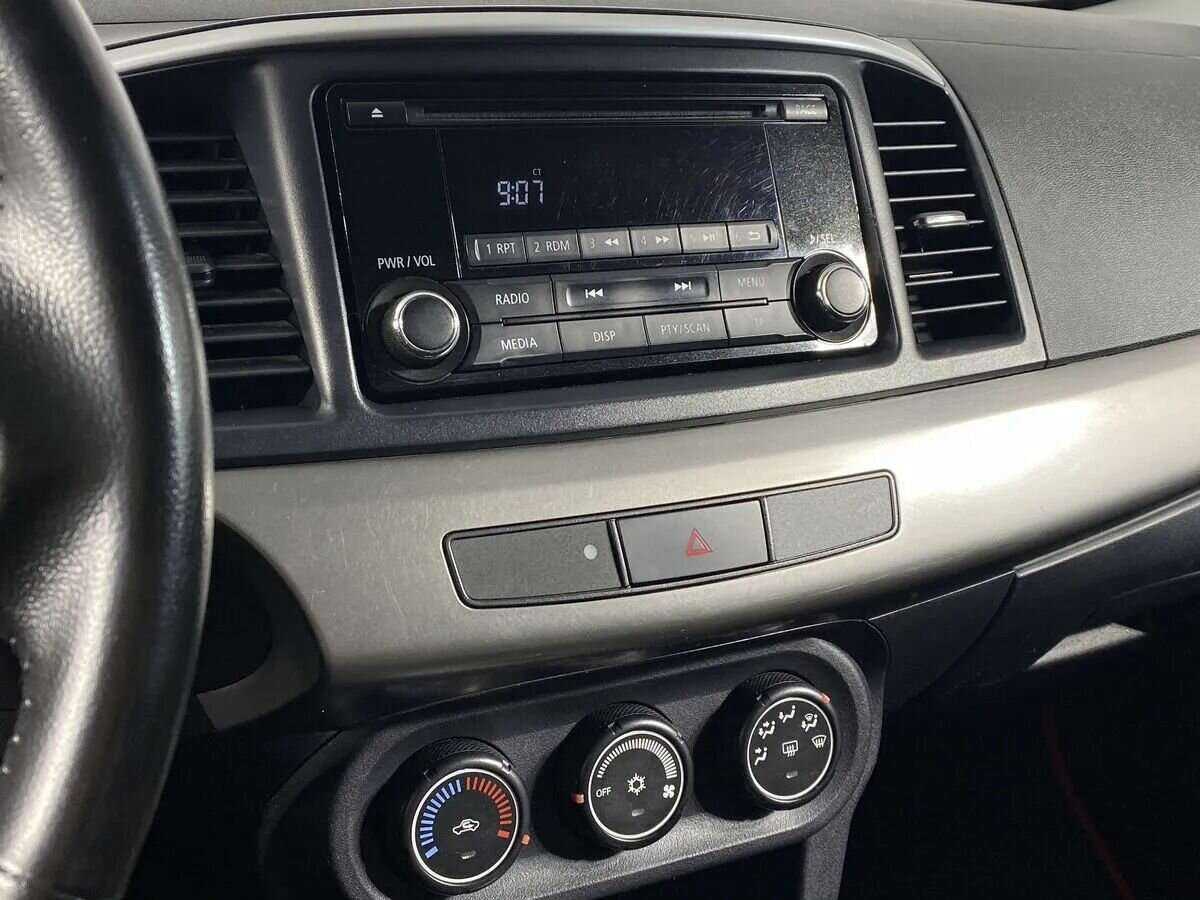 Купить Mitsubishi Lancer с пробегом. Фото: #9