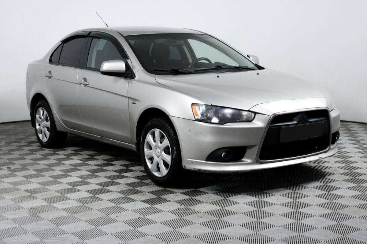 Купить Mitsubishi Lancer с пробегом. Фото: #2