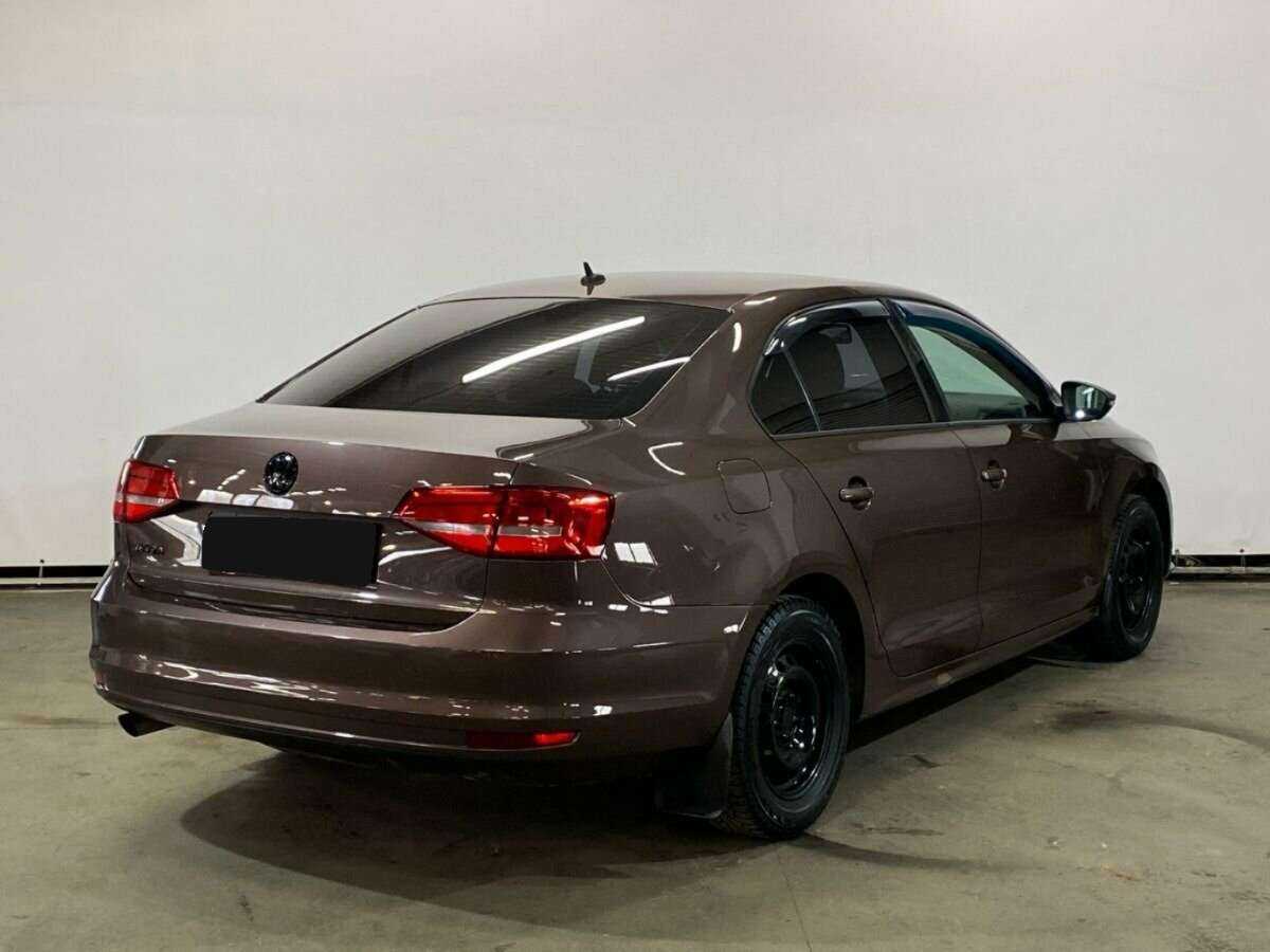 Купить Volkswagen Jetta с пробегом. Фото: #4