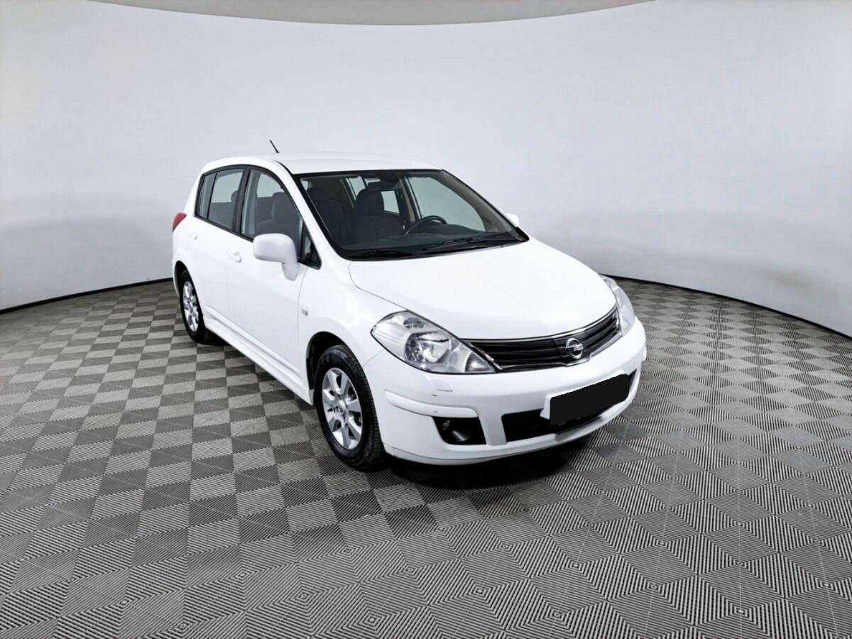 Купить Nissan Tiida с пробегом. Фото: #2