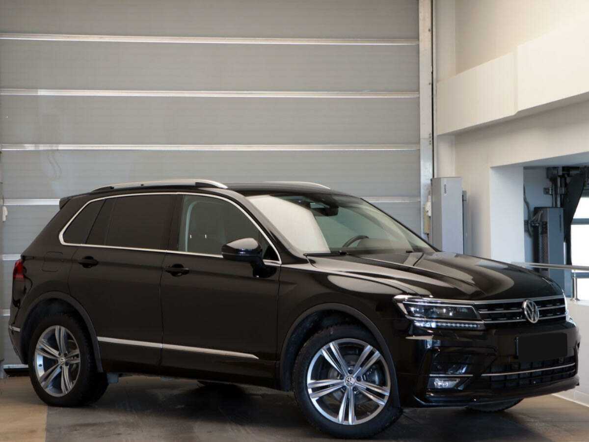 Купить Volkswagen Tiguan с пробегом. Фото: #2