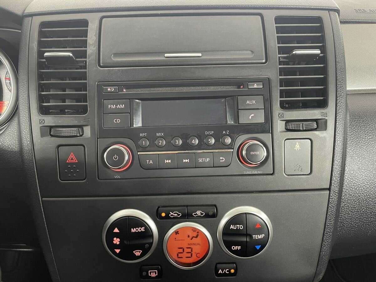 Купить Nissan Tiida с пробегом. Фото: #11