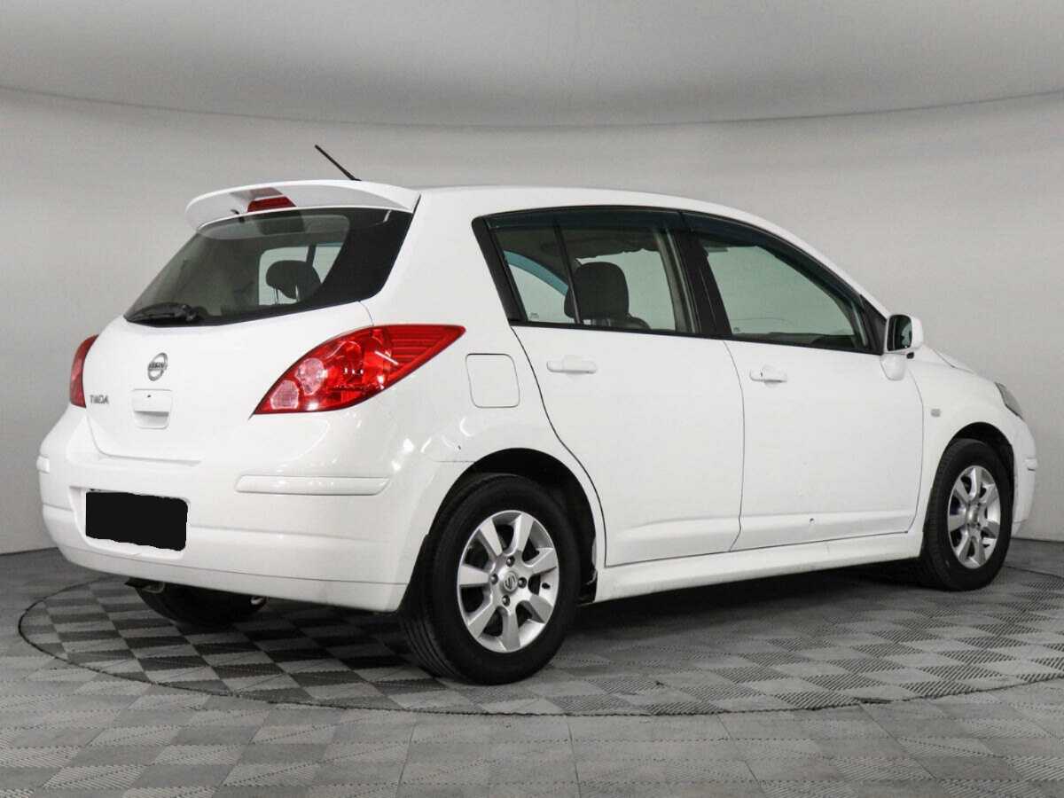 Купить Nissan Tiida с пробегом. Фото: #4