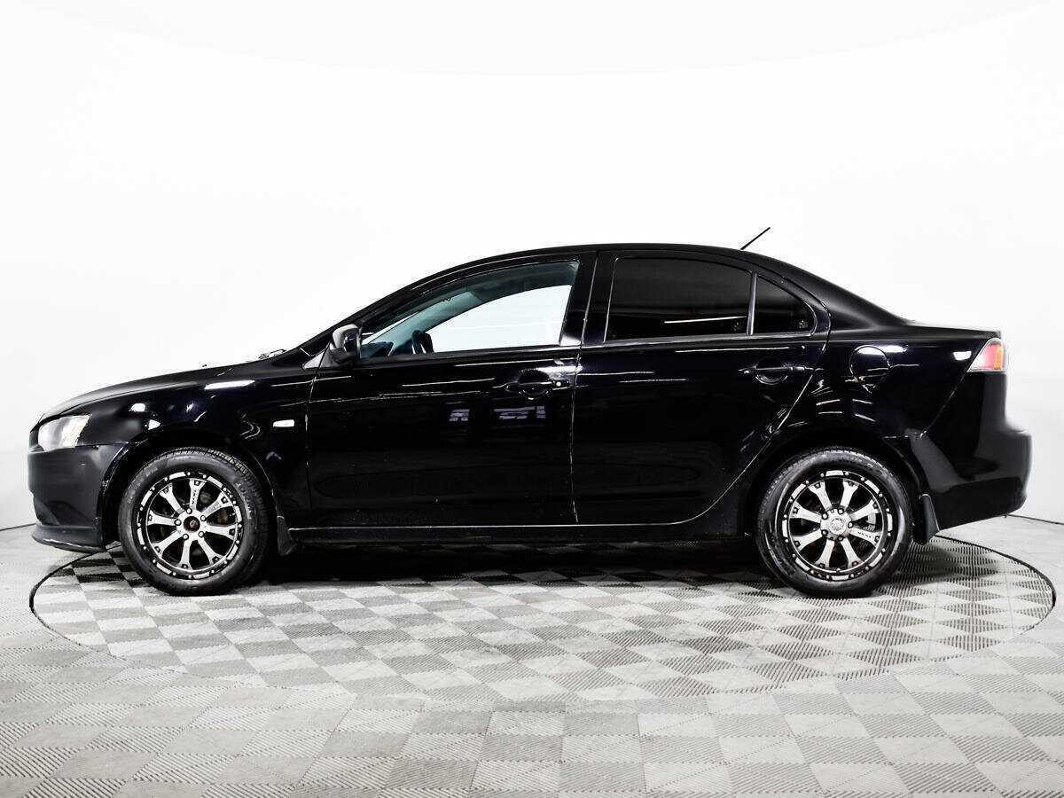 Купить Mitsubishi Lancer с пробегом. Фото: #7