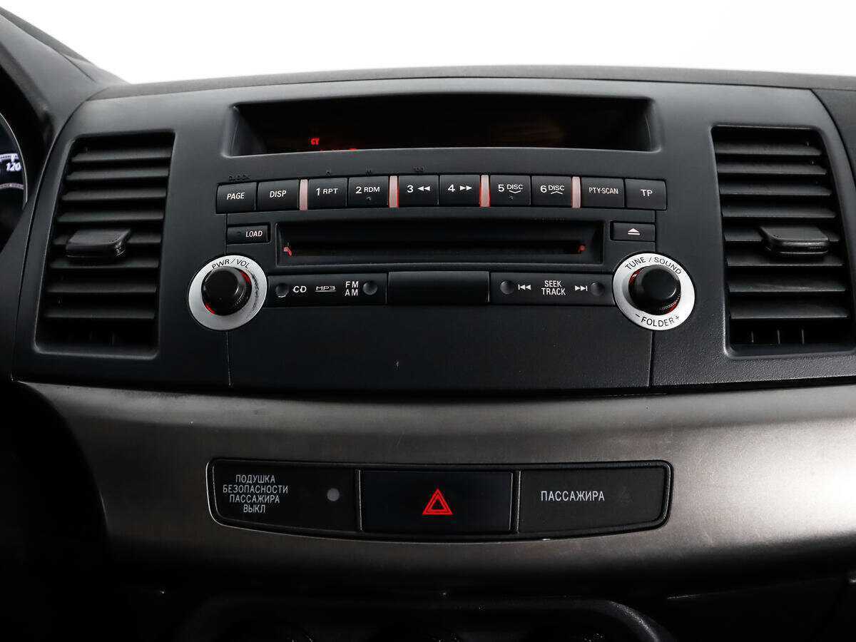 Купить Mitsubishi Lancer с пробегом. Фото: #10