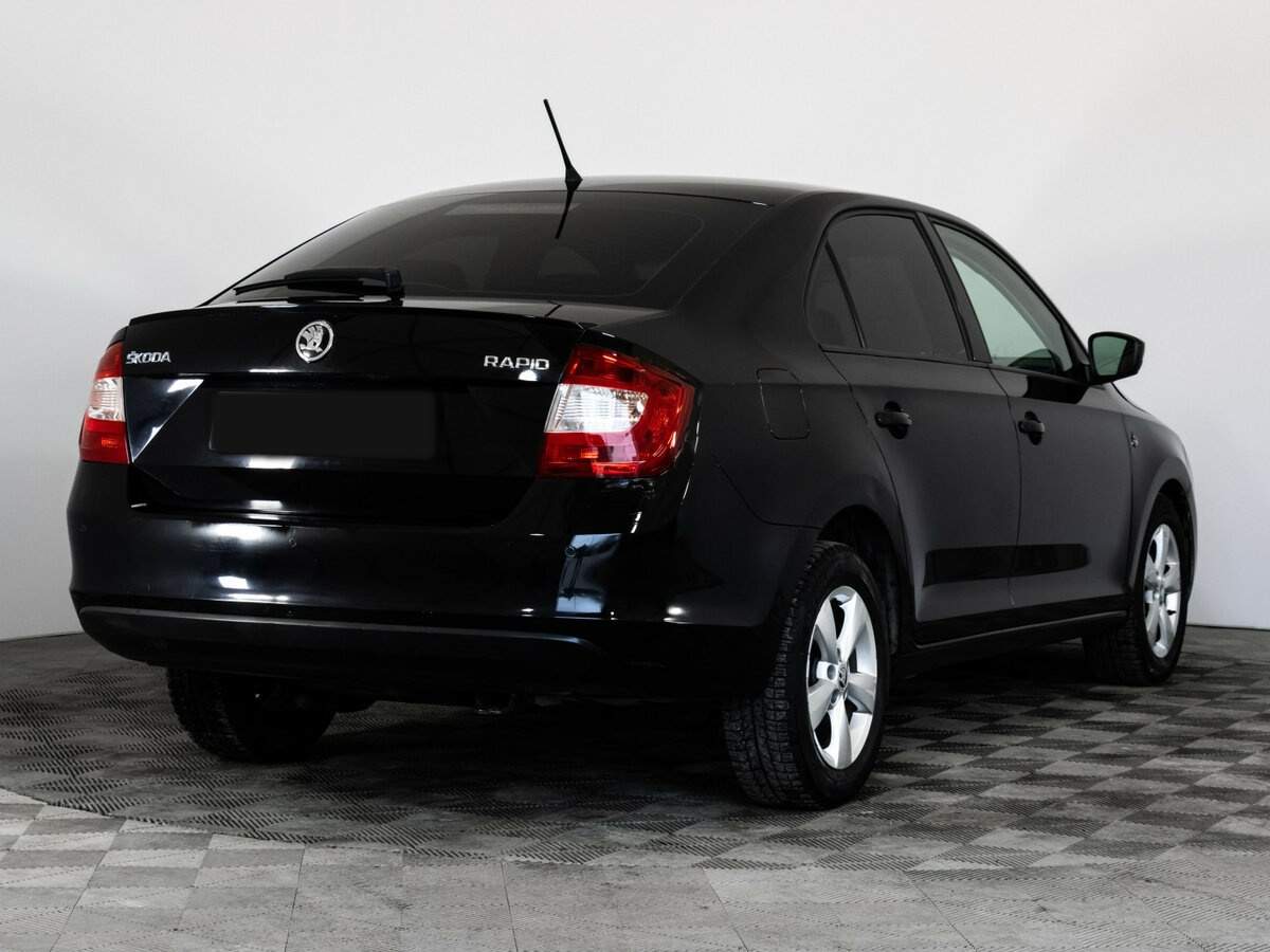 Купить Skoda Rapid с пробегом. Фото: #4