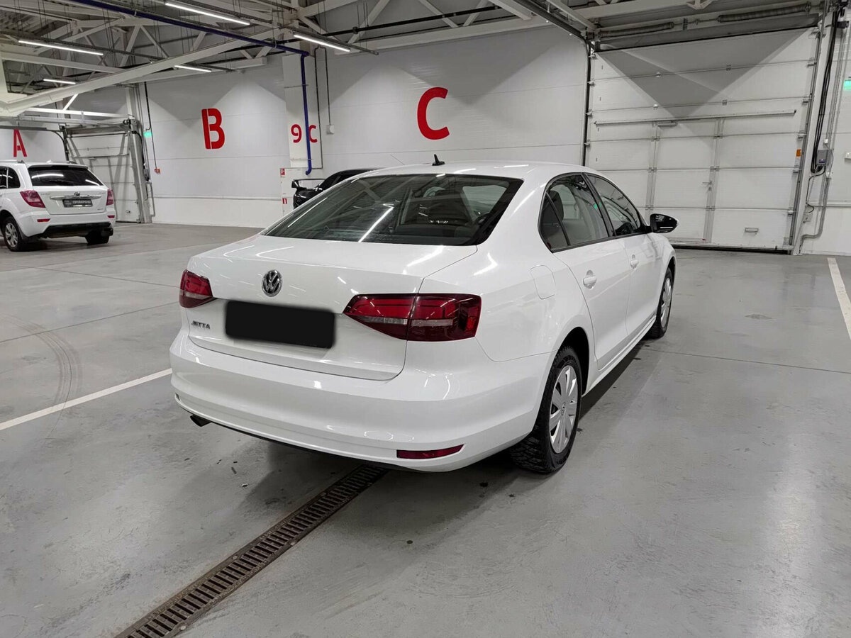 Купить Volkswagen Jetta с пробегом. Фото: #4